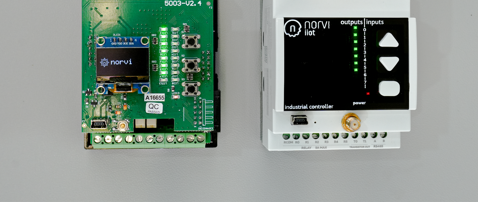 Screw-terminal wiring block and DIN-rail mount on a NORVI ESP32 PLC controller